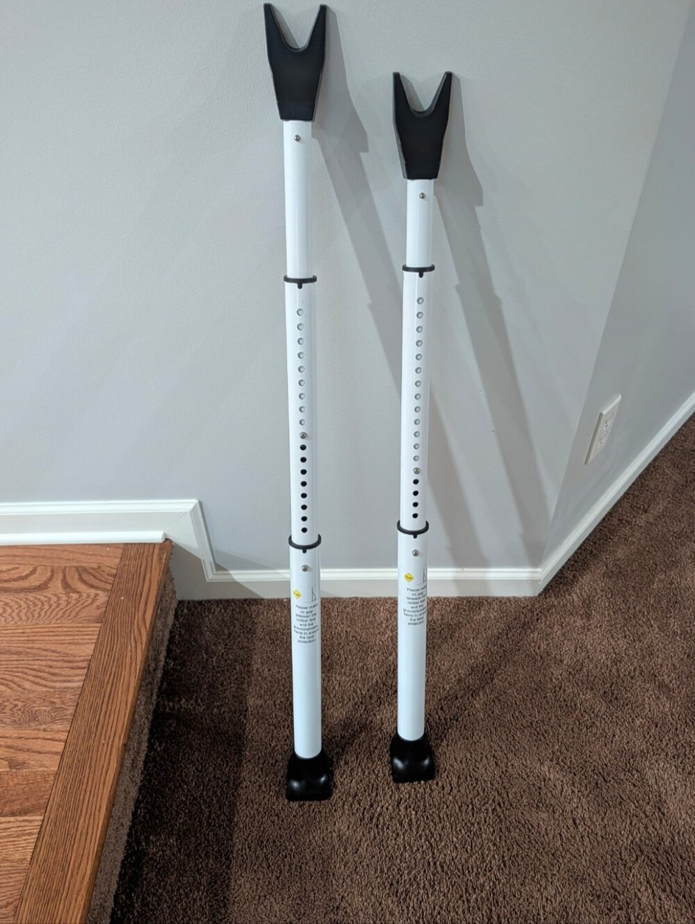 Adjustable White Support Poles with Black Tips - Home Accents